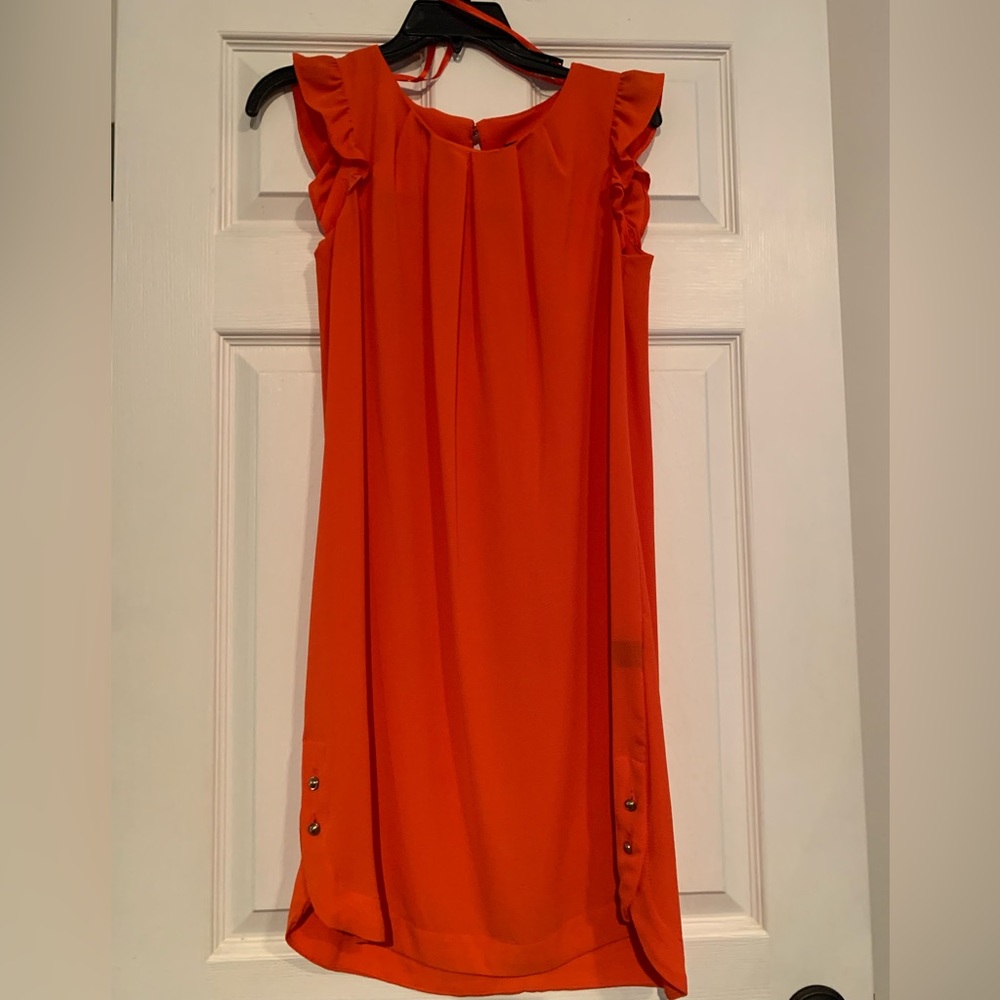 Reddish orange dress
